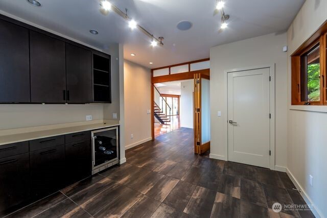 630 Harrison Street Friday Harbor, WA 98250 - Photo 24 of 37 a view of empty room with wooden floor and fan