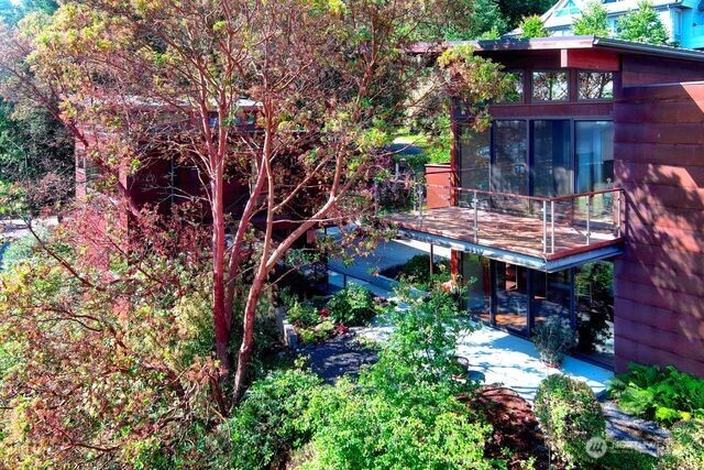 630 Harrison Street Friday Harbor, WA 98250 - Photo 10 of 37 a view of a patio with table and chairs and potted plants
