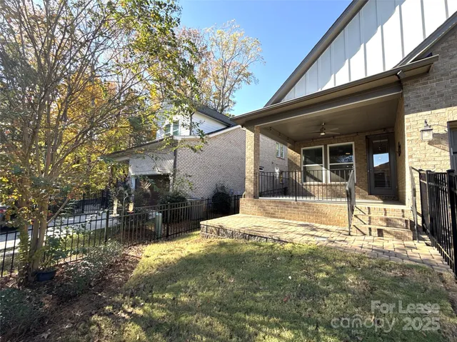a view of house with yard