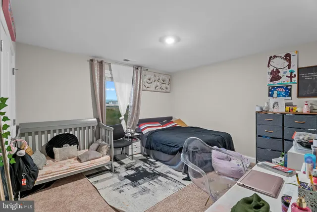 a room with furniture and a fireplace