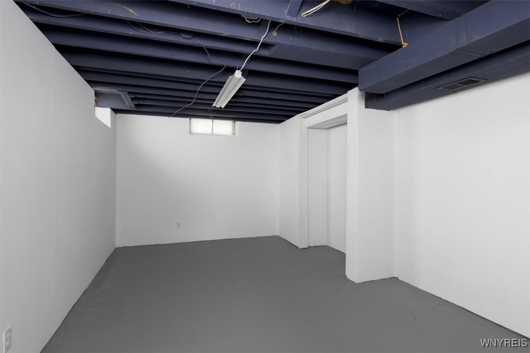125 Springfield Avenue Tonawanda, NY 14150 - Photo 12 of 18 Finished room in basement cold be used for home of