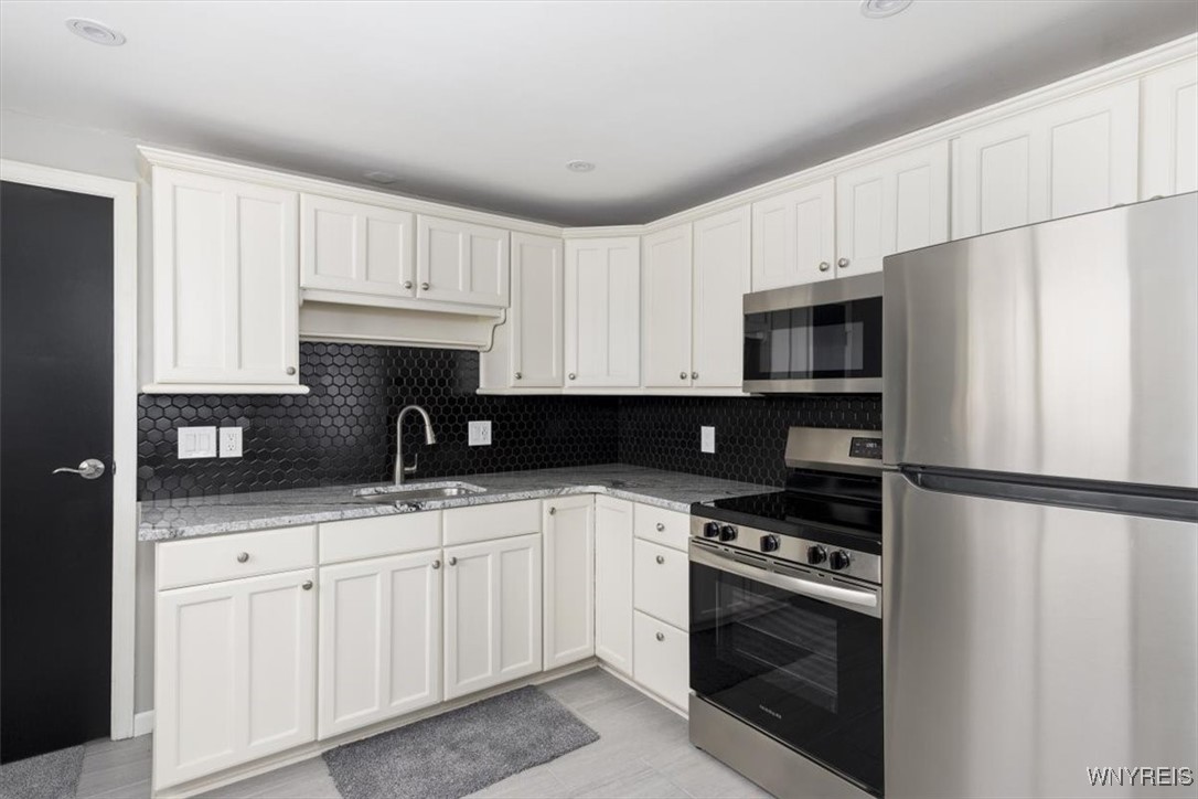 125 Springfield Avenue Tonawanda, NY 14150 - Photo 5 of 18 Brand new appliances stay in this meticulously upd