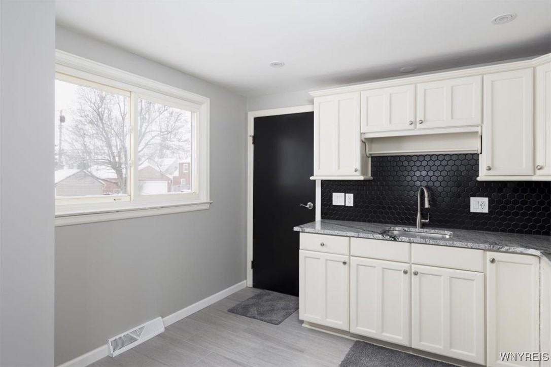 125 Springfield Avenue Tonawanda, NY 14150 - Photo 7 of 18 Another view of the Kitchen looking toward door to