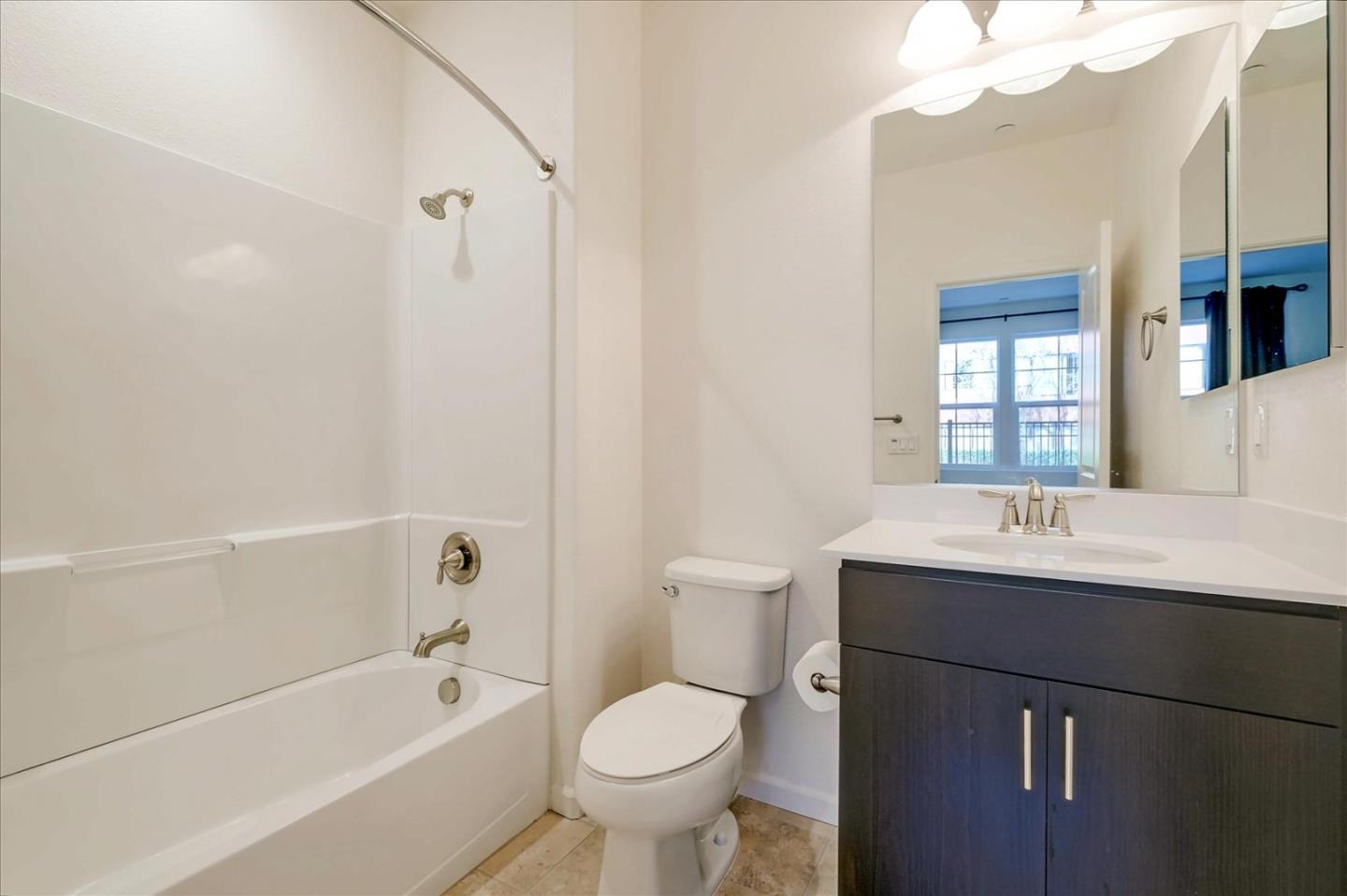39846 Sawyer Terrace Newark, CA 94560 - Photo 11 of 21 a bathroom with a sink a toilet and bathtub