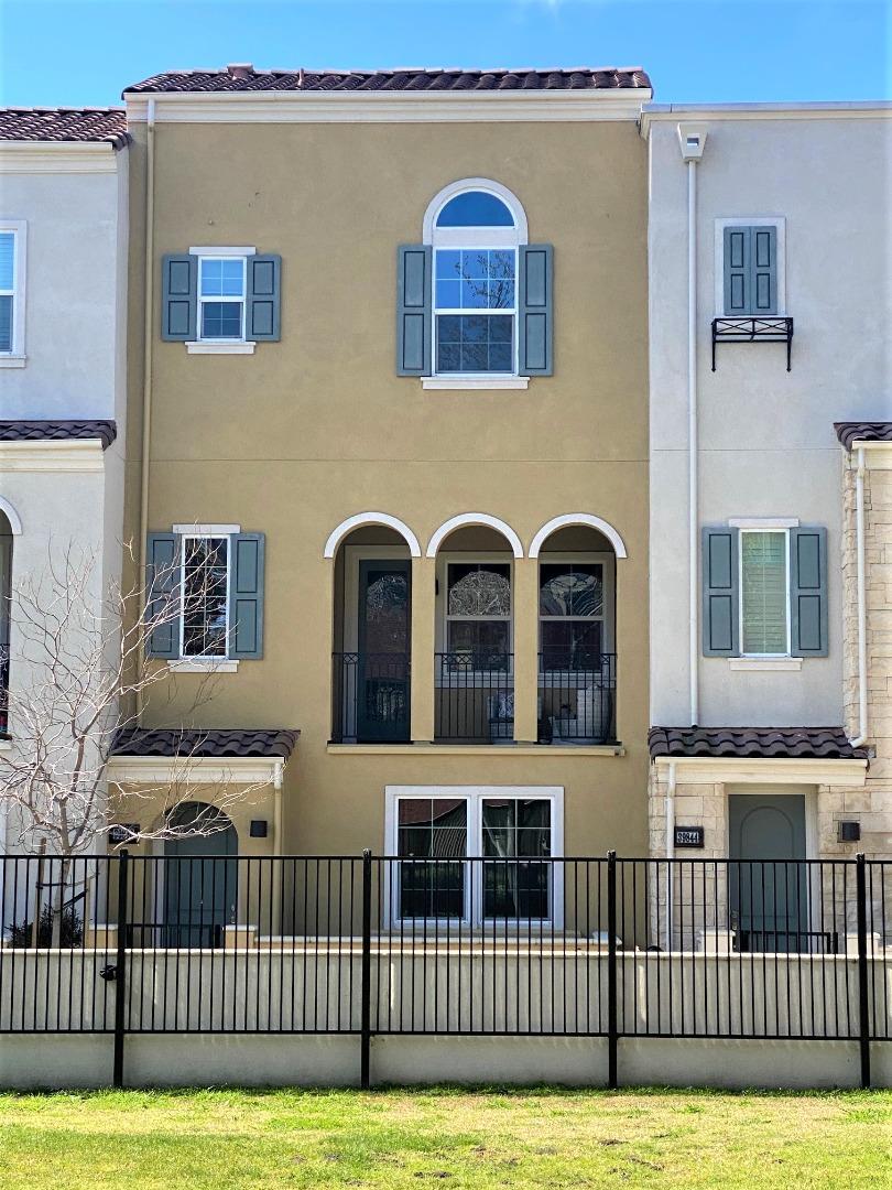 39846 Sawyer Terrace Newark, CA 94560 - Photo 3 of 21 a view of a brick house with many windows