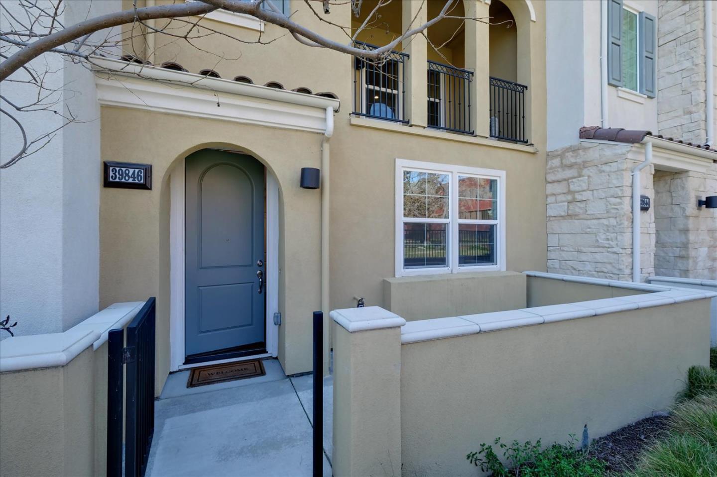 39846 Sawyer Terrace Newark, CA 94560 - Photo 4 of 21 a front view of a house with large windows