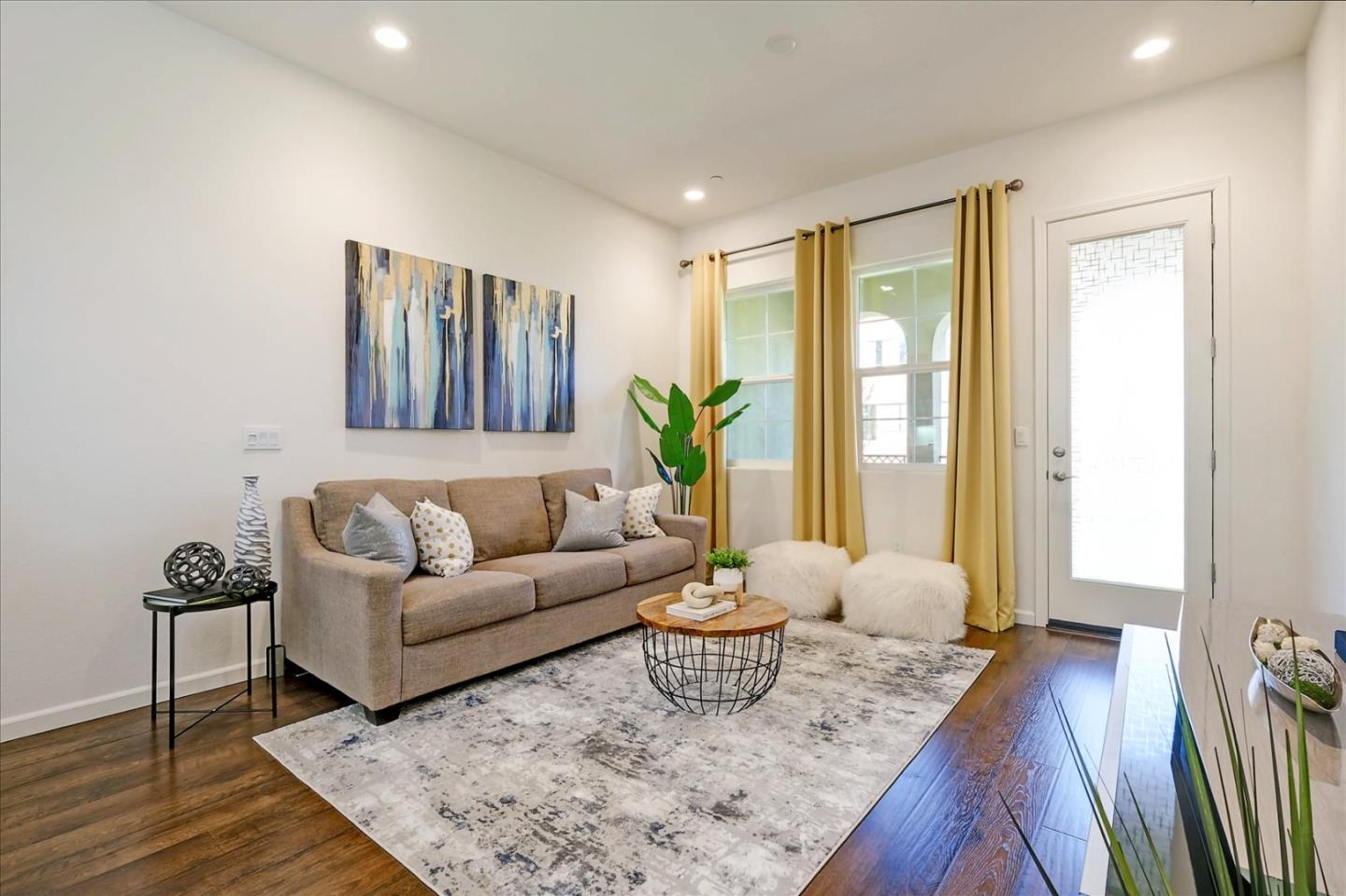 39846 Sawyer Terrace Newark, CA 94560 - Photo 6 of 21 a living room with furniture and wooden floor