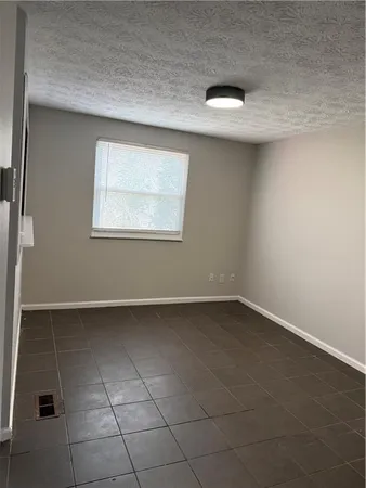 an empty room with a workbench