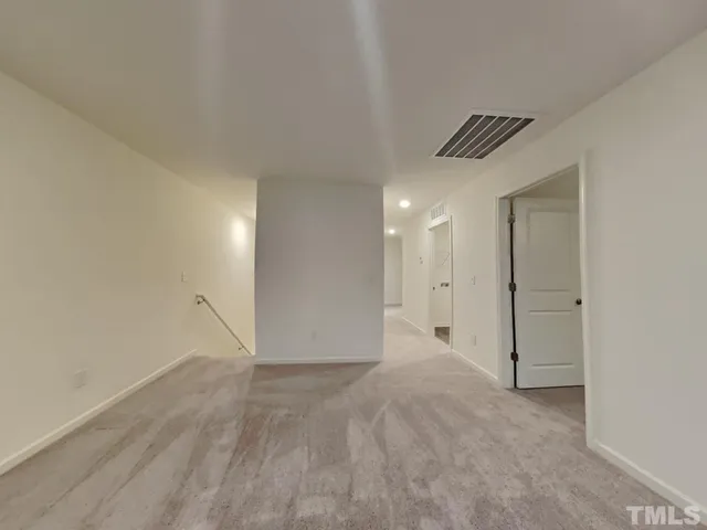 a bathroom with a toilet and a bathtub