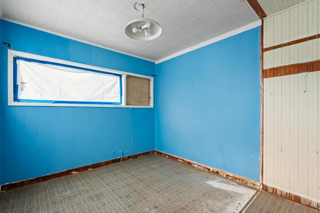 an empty room with a window