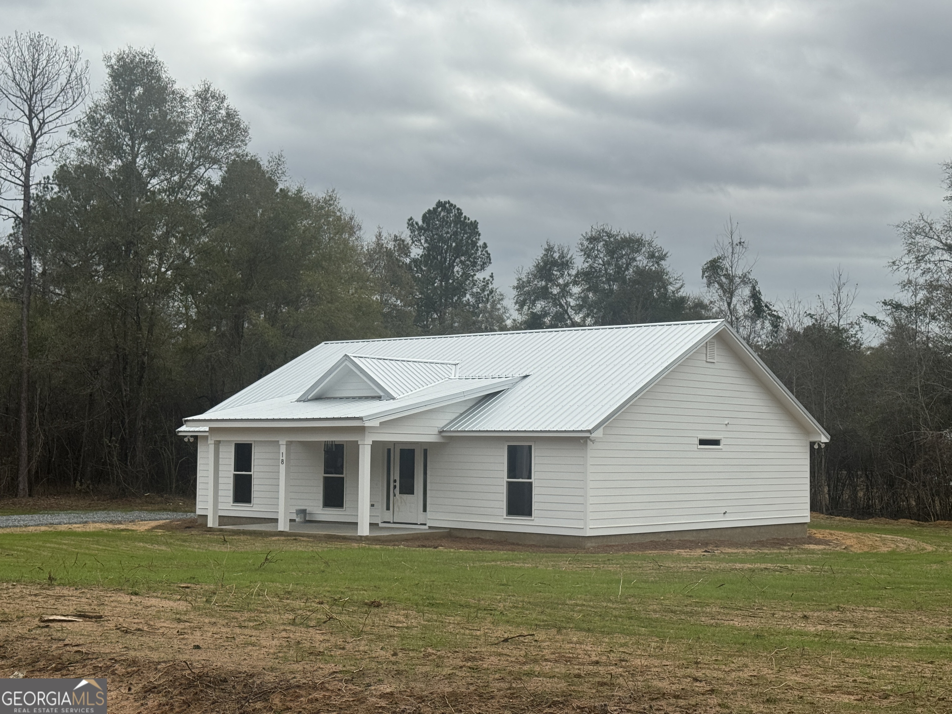 18 Redbreast Drive Vienna, GA 31092 - Photo 1 of 1 a front view of a house with a garden