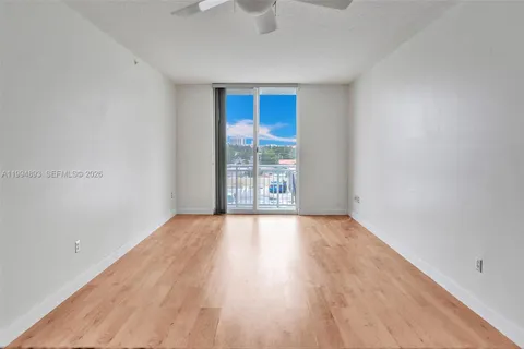 a bathroom with a shower and a sink