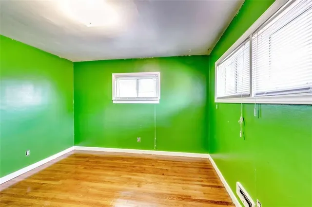 a view of entryway with wooden floor