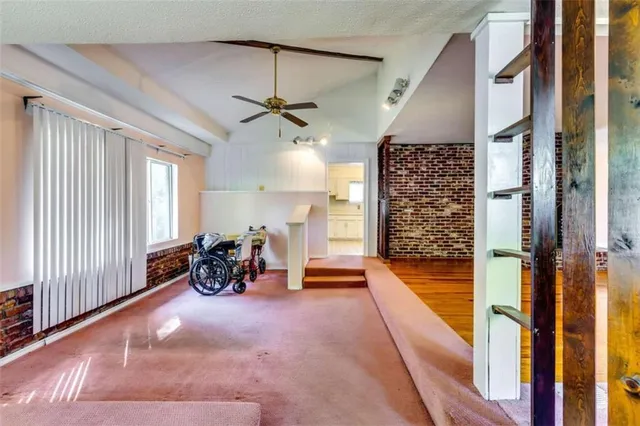 workspace with furniture and a chandelier