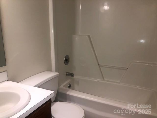 5904 White Cliffs Drive Monroe, NC 28110 - Photo 7 of 16 a bathroom with a toilet and a bath tub