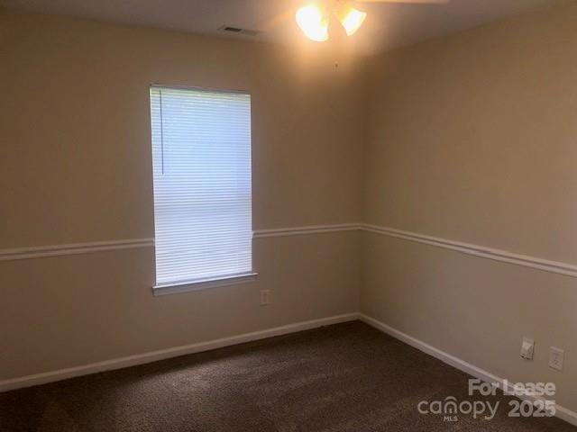 5904 White Cliffs Drive Monroe, NC 28110 - Photo 8 of 16 an empty room with a window
