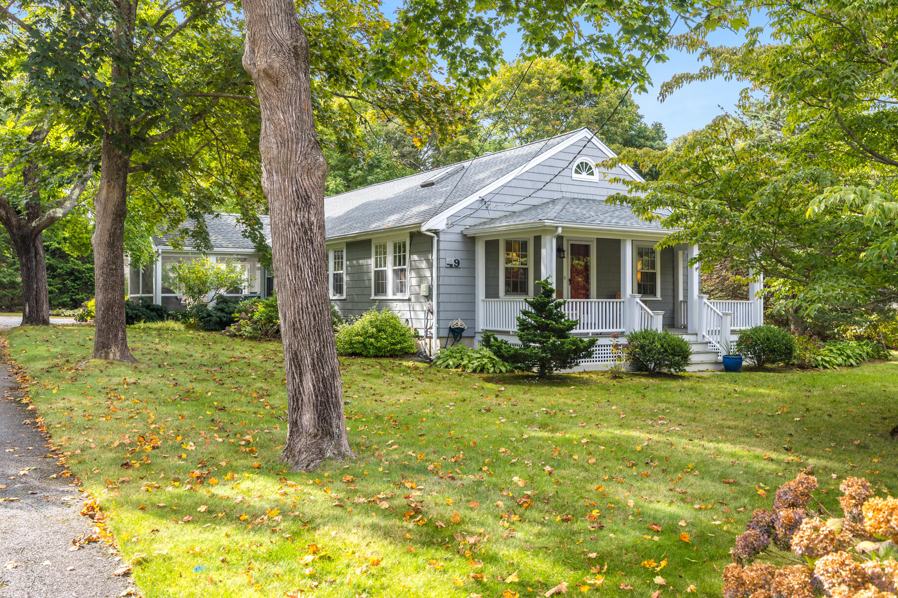 49 Fire Station Road Osterville, MA 02655 - Photo 1 of 32 a view of a house with backyard and a tree