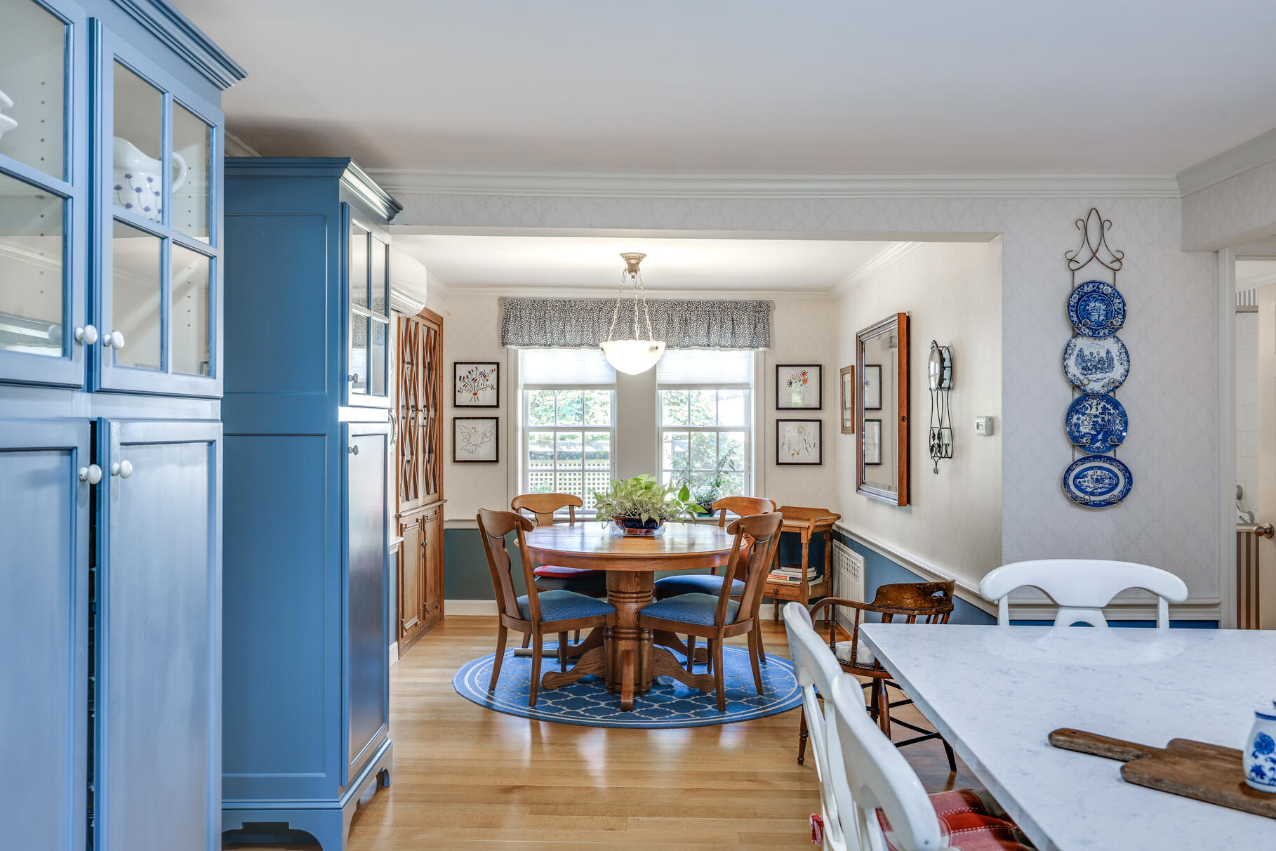 49 Fire Station Road Osterville, MA 02655 - Photo 11 of 32 a dining room with furniture a rug and wooden floor