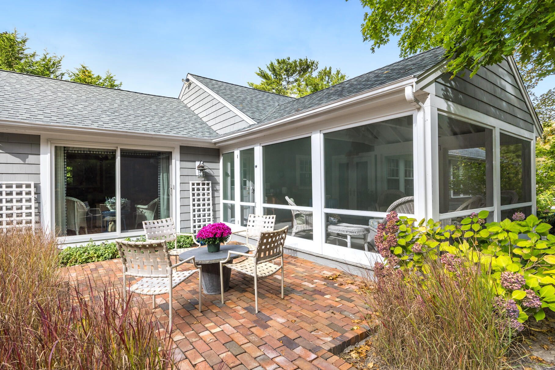 49 Fire Station Road Osterville, MA 02655 - Photo 29 of 32 a front view of house with yard and outdoor seating
