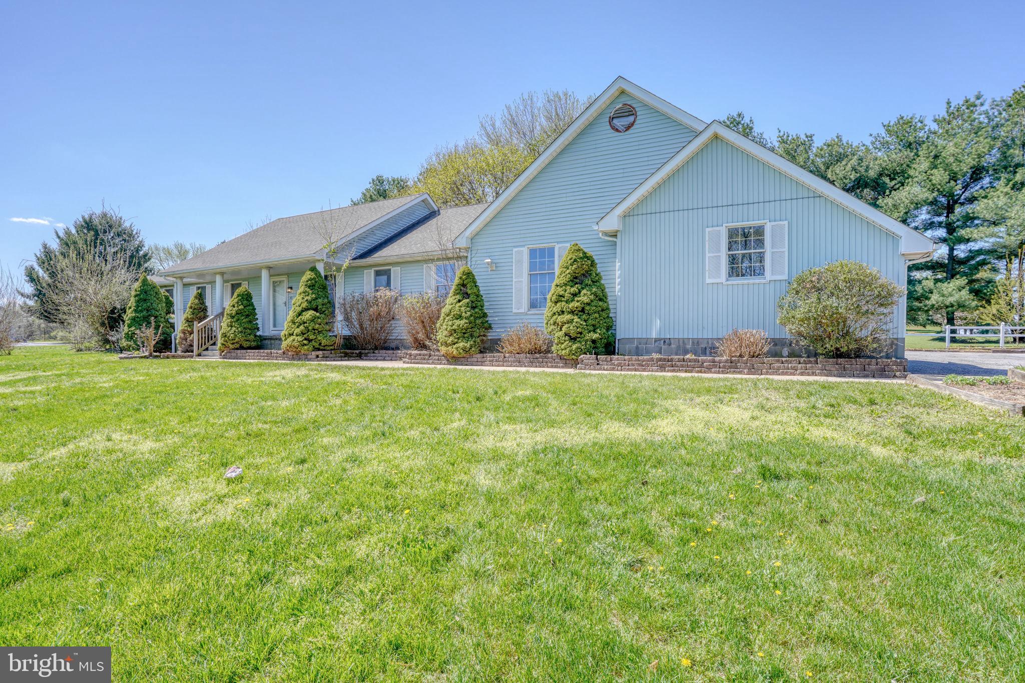 102 Green Giant Road Townsend, DE 19734 - Photo 12 of 43 Charming blue home on lush green lawn.