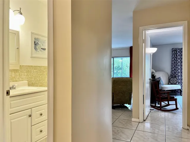 a view of a bedroom from a hallway