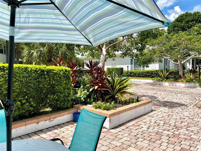 a view of a two chairs in the patio