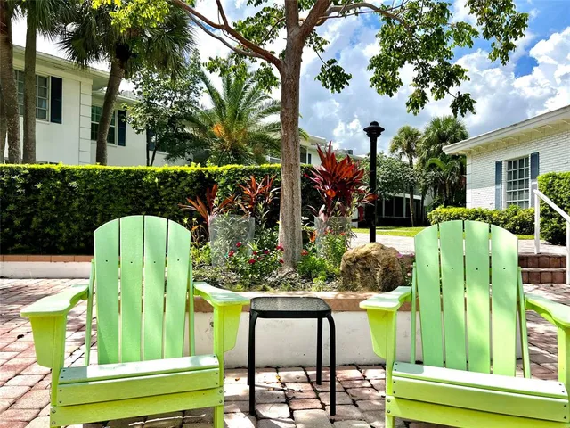 a view of house with patio outdoor seating