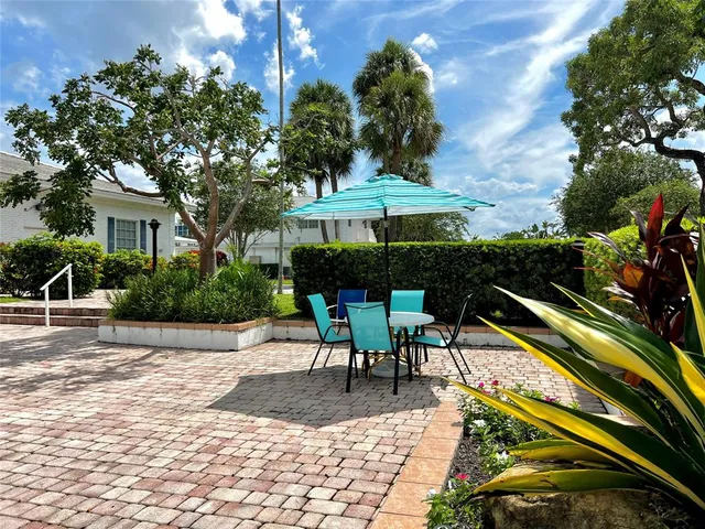 a view of a living room and floor to ceiling window