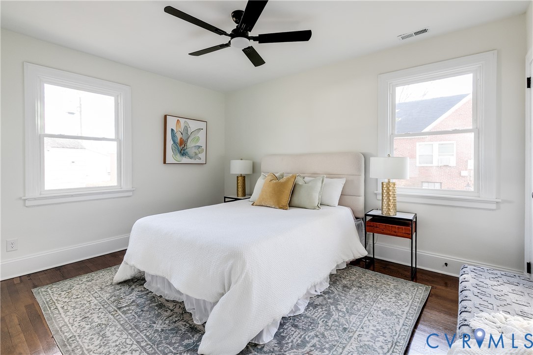 2207 Rawlings Street Henrico, VA 23231 - Photo 12 of 28 a bedroom with a bed and wooden floor