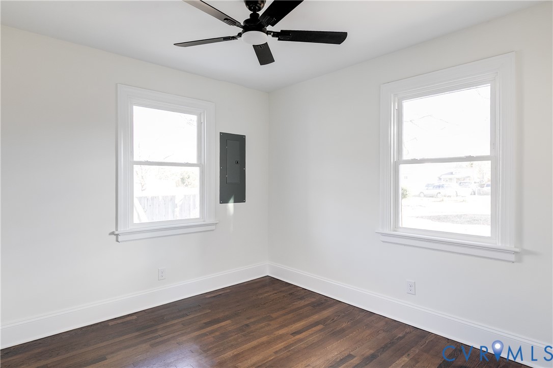 2207 Rawlings Street Henrico, VA 23231 - Photo 17 of 28 a view of an empty room with wooden floor and a window