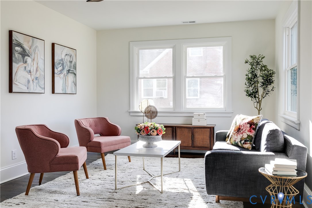 2207 Rawlings Street Henrico, VA 23231 - Photo 2 of 28 a living room with furniture and a potted plant