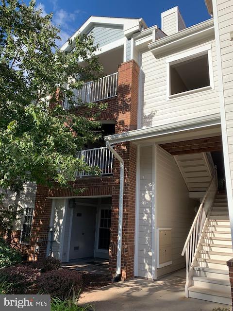 20960 Timber Ridge Terrace, Unit 101 Ashburn, VA 20147 - Photo 1 of 22 Front entrance