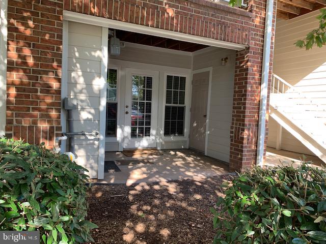 20960 Timber Ridge Terrace, Unit 101 Ashburn, VA 20147 - Photo 3 of 22 Spacious covered patio
