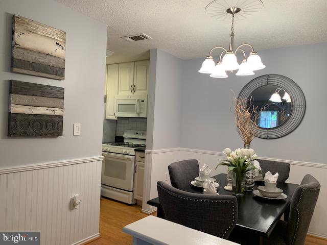 20960 Timber Ridge Terrace, Unit 101 Ashburn, VA 20147 - Photo 8 of 22 Spacious dining room