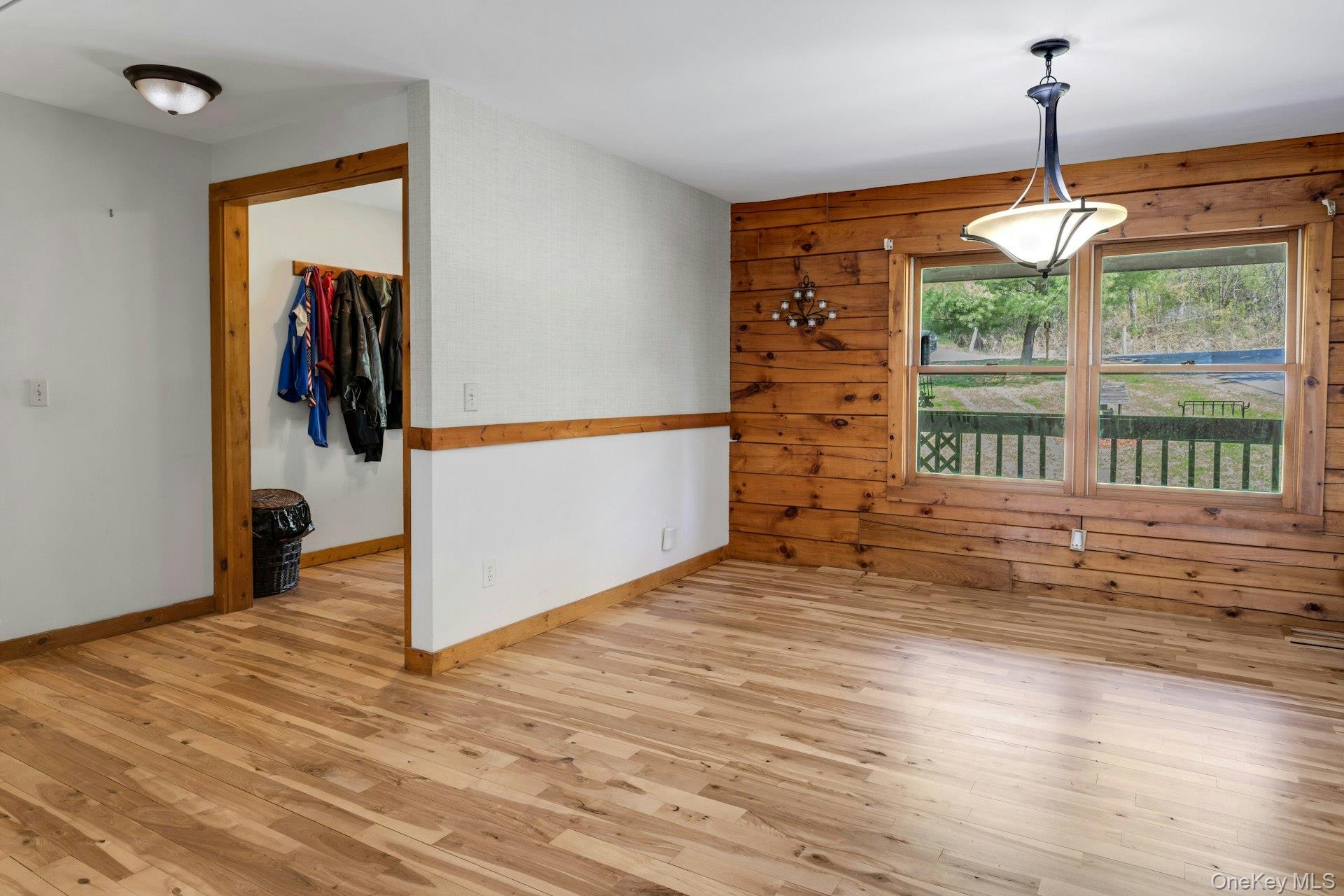 354 Sunset Hill Road East Fishkill, NY 12524 - Photo 13 of 31 a view of empty room with wooden floor and fan