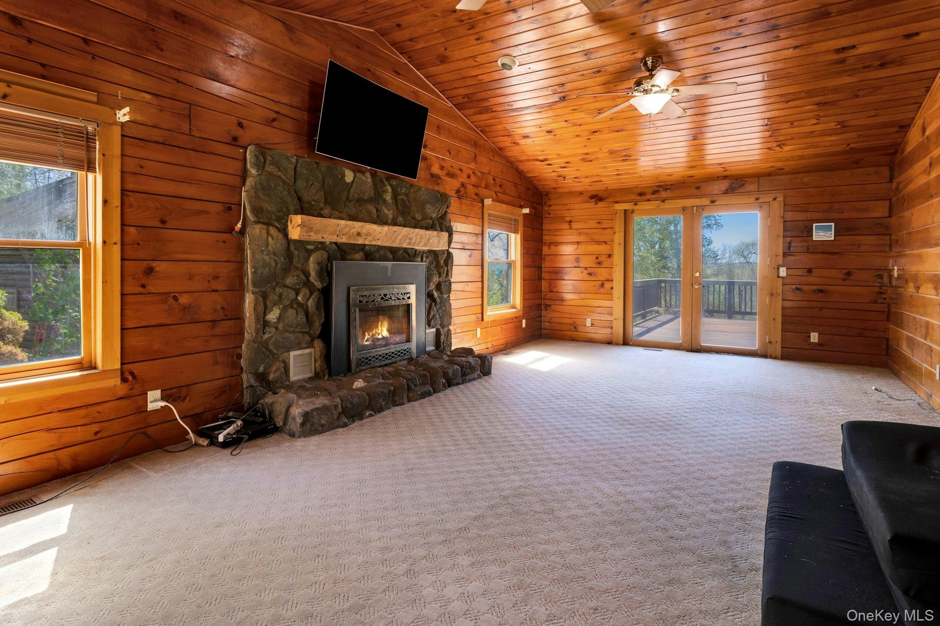 354 Sunset Hill Road East Fishkill, NY 12524 - Photo 15 of 31 a view of a livingroom with furniture and a fireplace