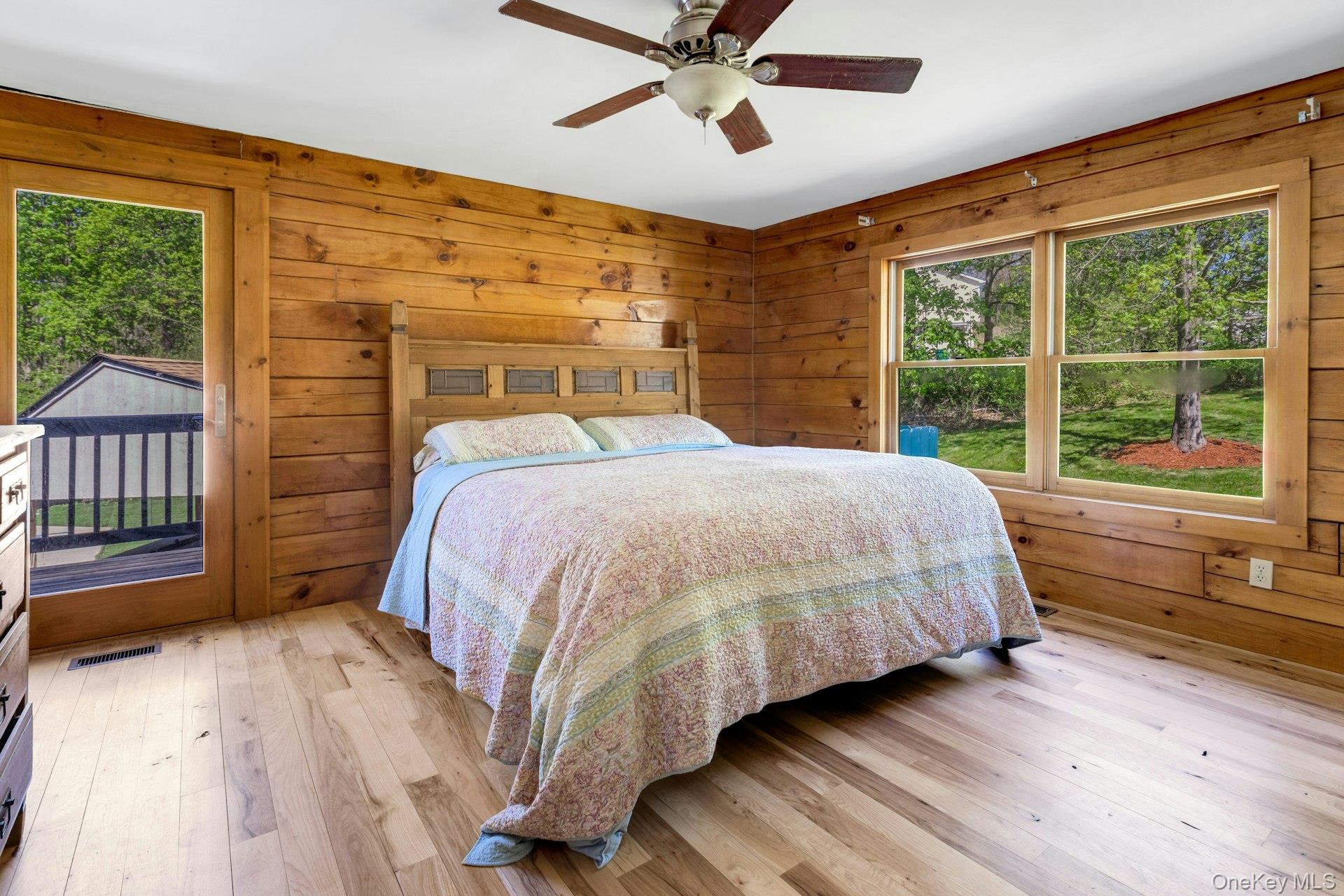 354 Sunset Hill Road East Fishkill, NY 12524 - Photo 16 of 31 a bedroom with a bed and a large window