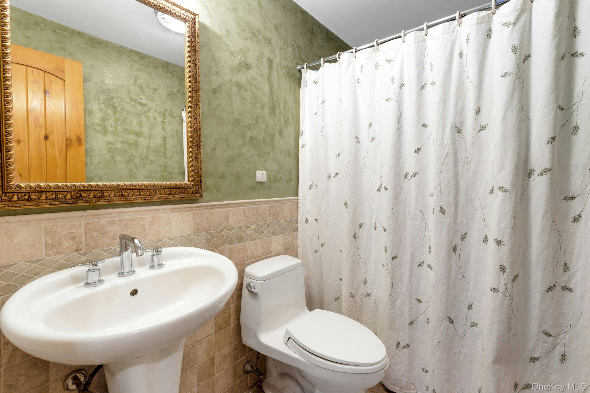 354 Sunset Hill Road East Fishkill, NY 12524 - Photo 21 of 31 a bathroom with a sink a toilet and shower