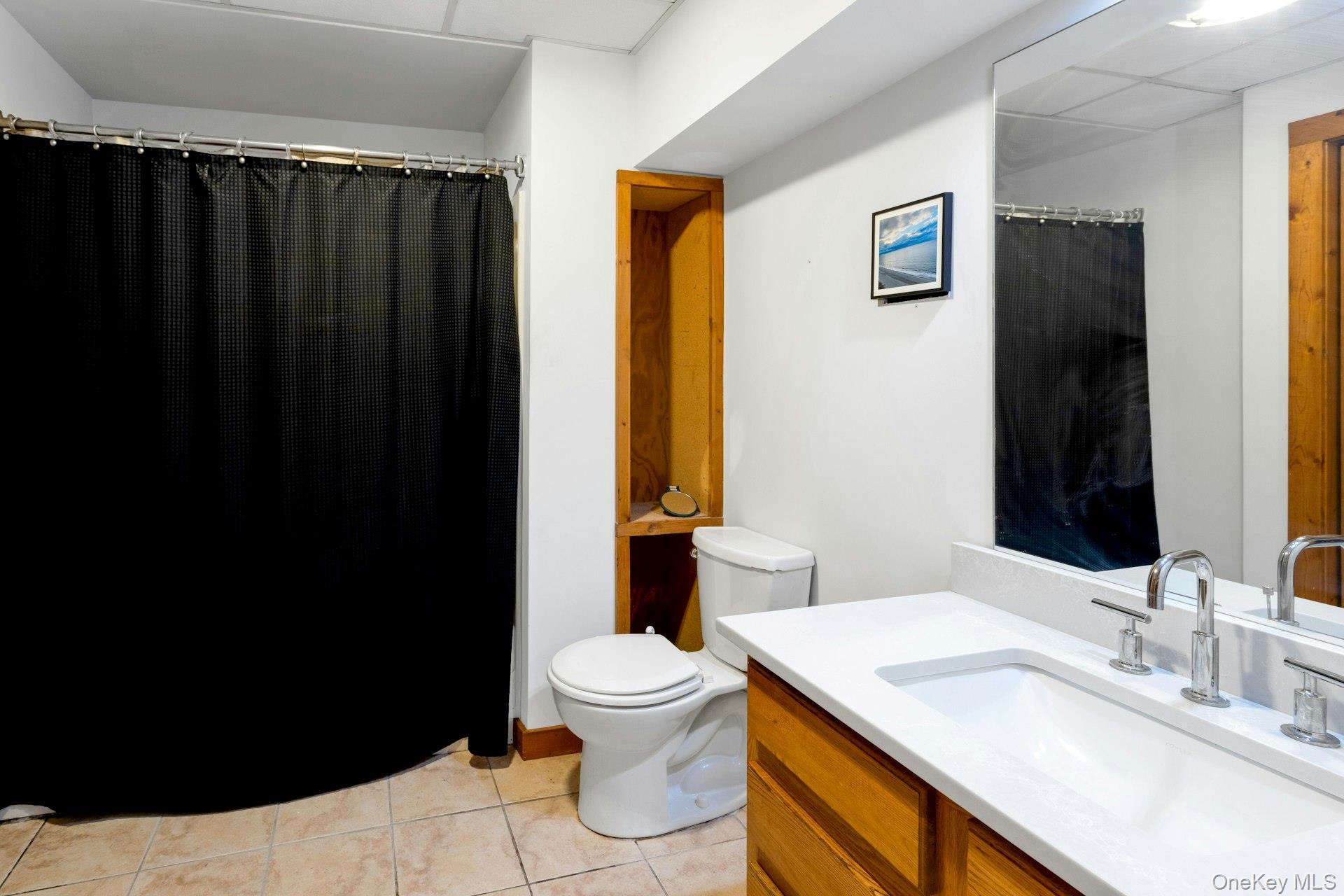 354 Sunset Hill Road East Fishkill, NY 12524 - Photo 22 of 31 a bathroom with a sink and a mirror