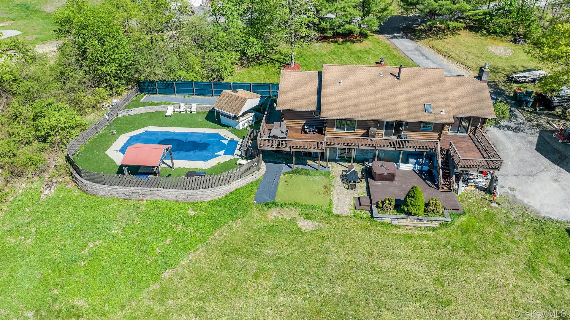 354 Sunset Hill Road East Fishkill, NY 12524 - Photo 27 of 31 an aerial view of a house having patio