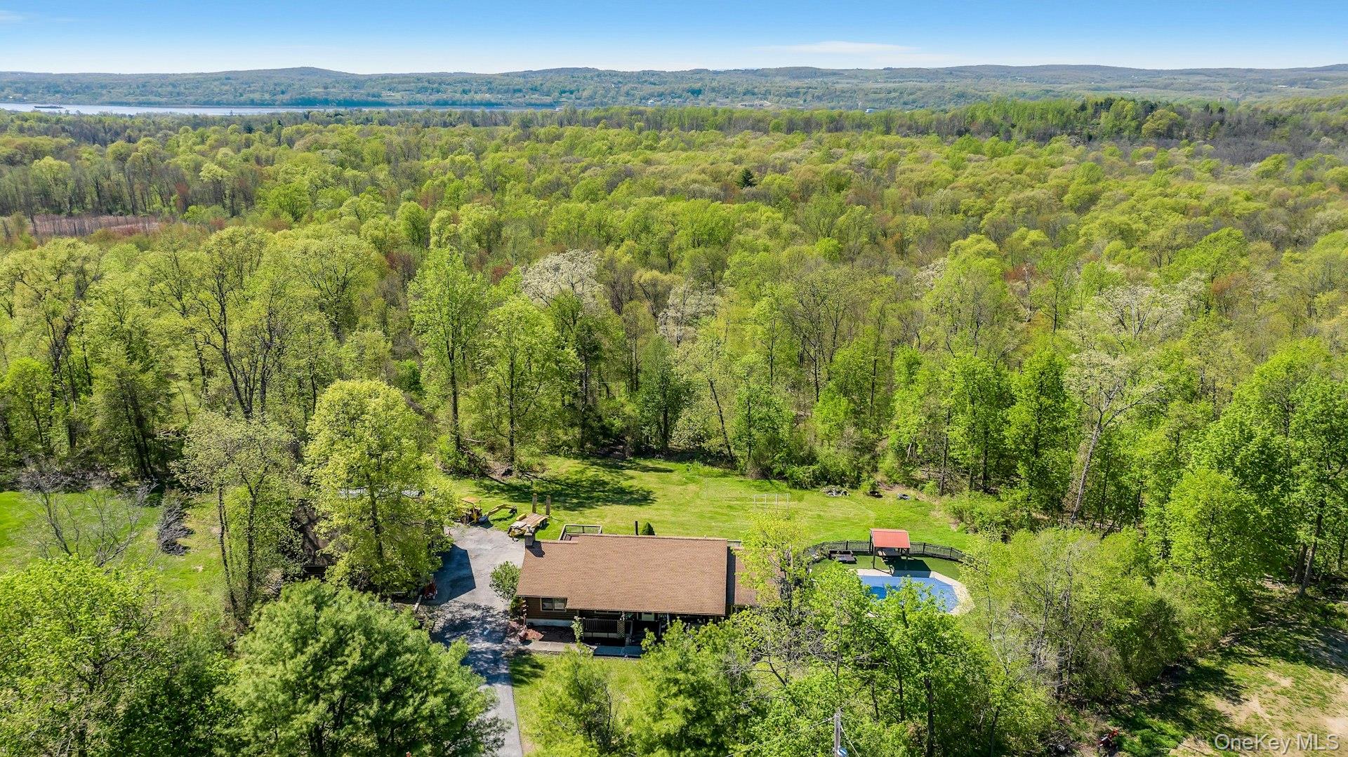 354 Sunset Hill Road East Fishkill, NY 12524 - Photo 31 of 31 an aerial view of residential houses with outdoor space and trees