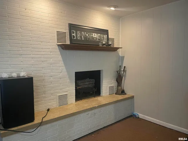 a living room with a fireplace