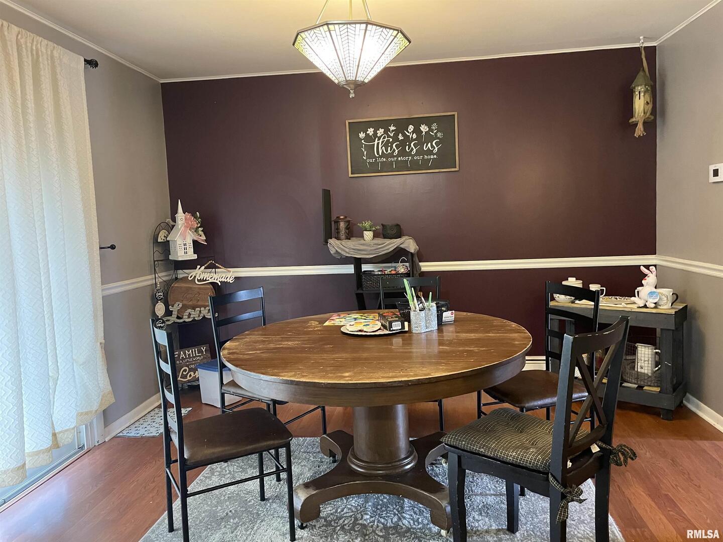217 Apple Lane Anna, IL 62906 - Photo 10 of 39 a view of a dining room with furniture and wooden floor