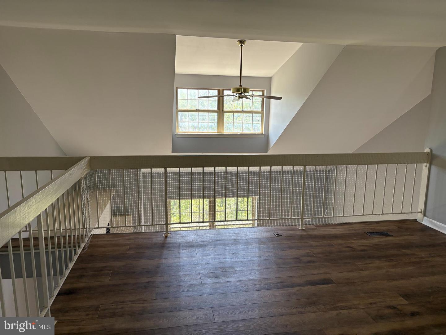 178 English Run Circle Sparks Glencoe, MD 21152 - Photo 18 of 24 a view of an empty room with wooden floor
