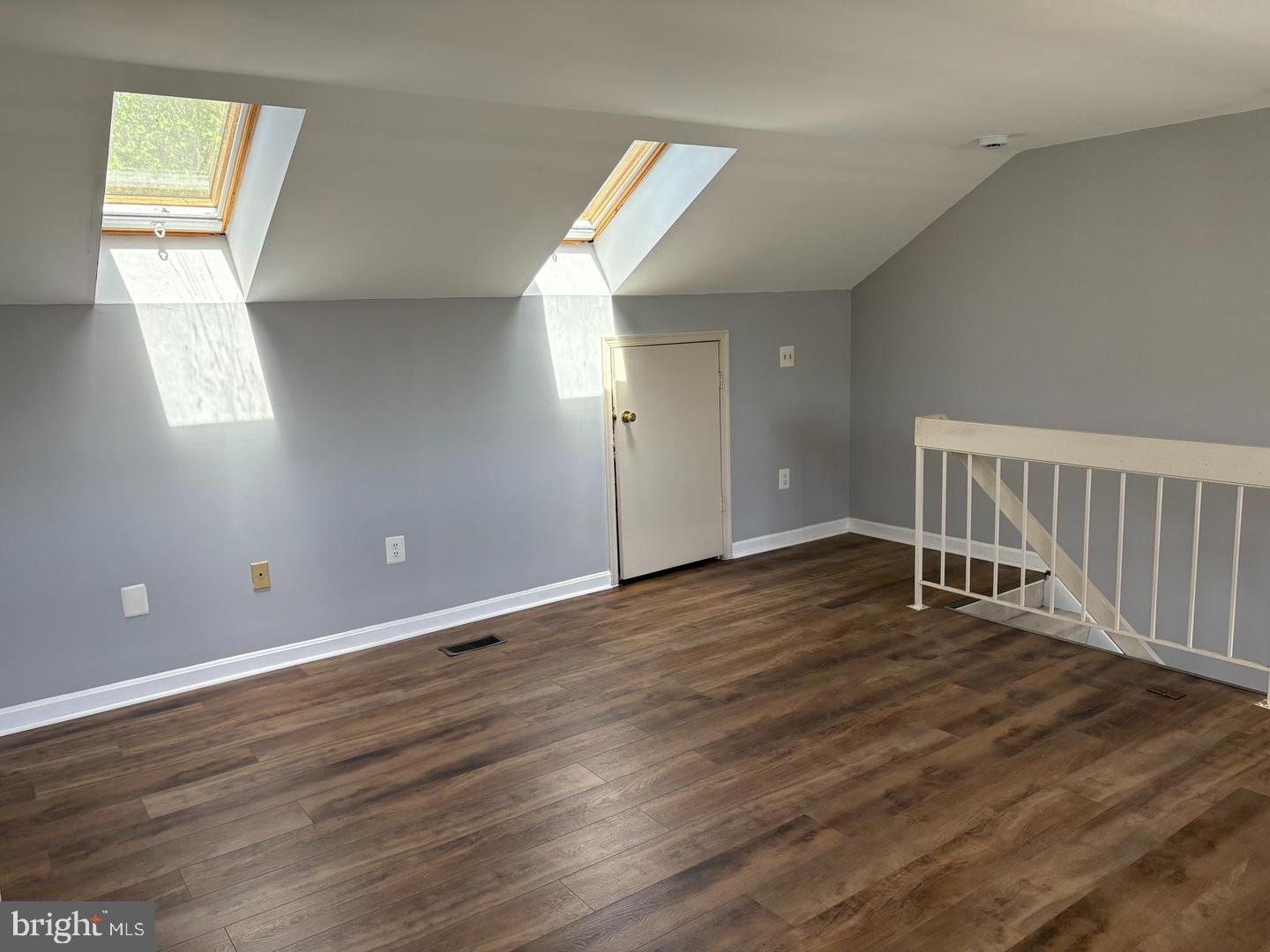 178 English Run Circle Sparks Glencoe, MD 21152 - Photo 19 of 24 an empty room with wooden floor and windows