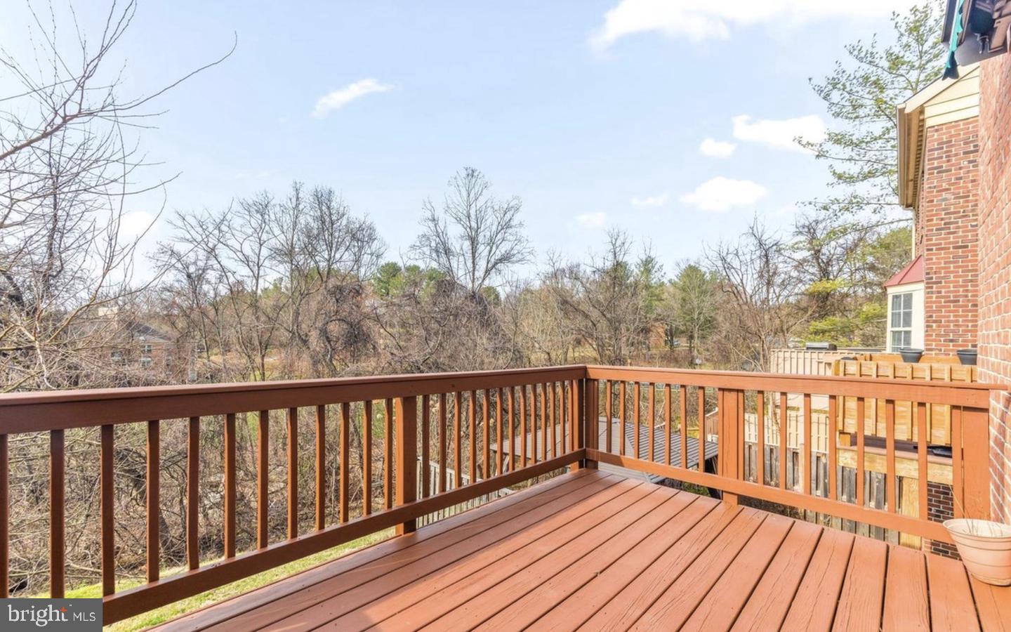 178 English Run Circle Sparks Glencoe, MD 21152 - Photo 21 of 24 a view of roof deck with wooden floor and fence