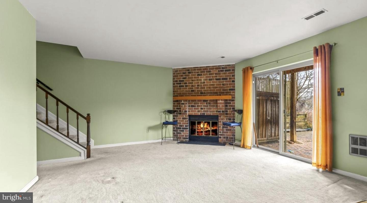 178 English Run Circle Sparks Glencoe, MD 21152 - Photo 23 of 24 a view of an empty room with fireplace and a window