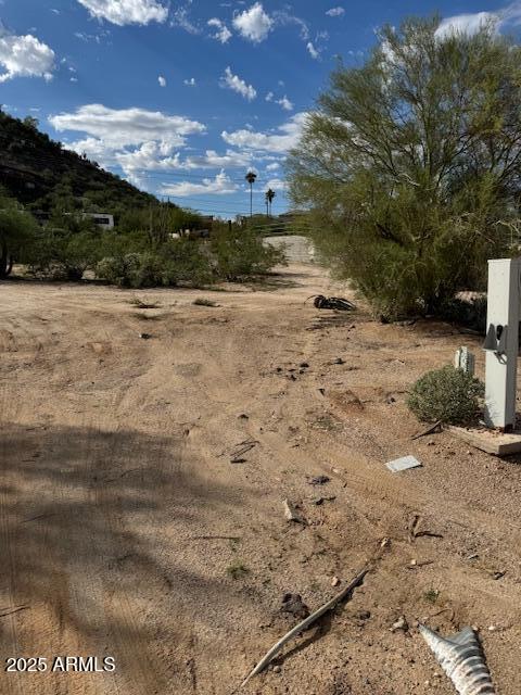 19847 North Cave Creek Road Phoenix, AZ 85024 - Photo 5 of 7 a view of a yard with wooden fence