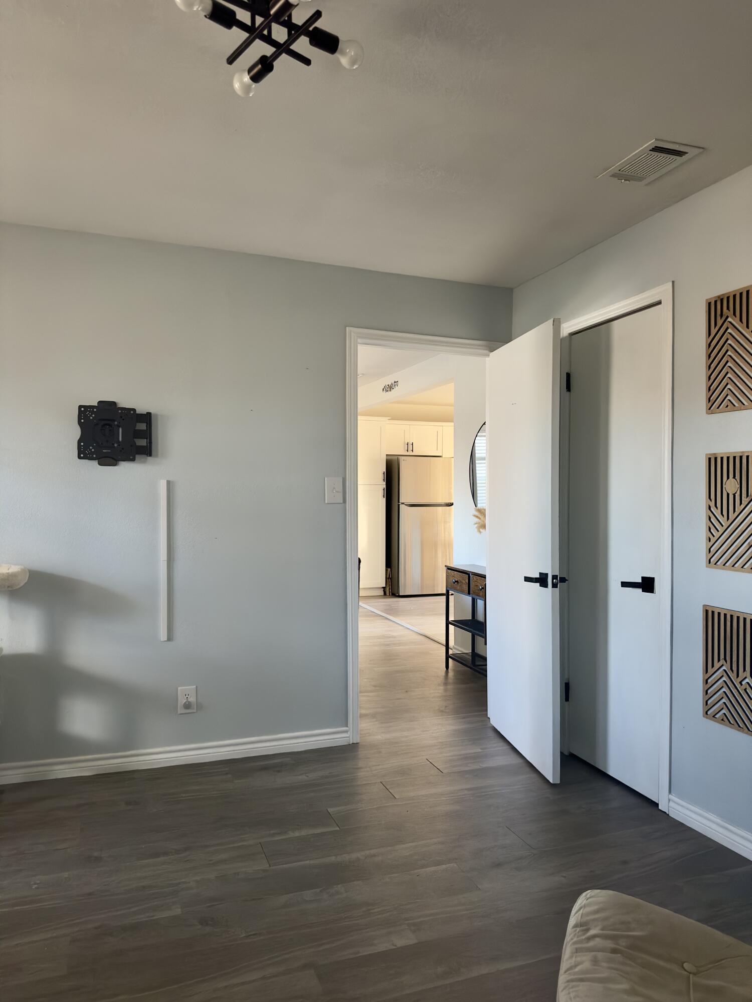 4807 39th Street Lubbock, TX 79414 - Photo 11 of 29 a view of empty room with wooden floor