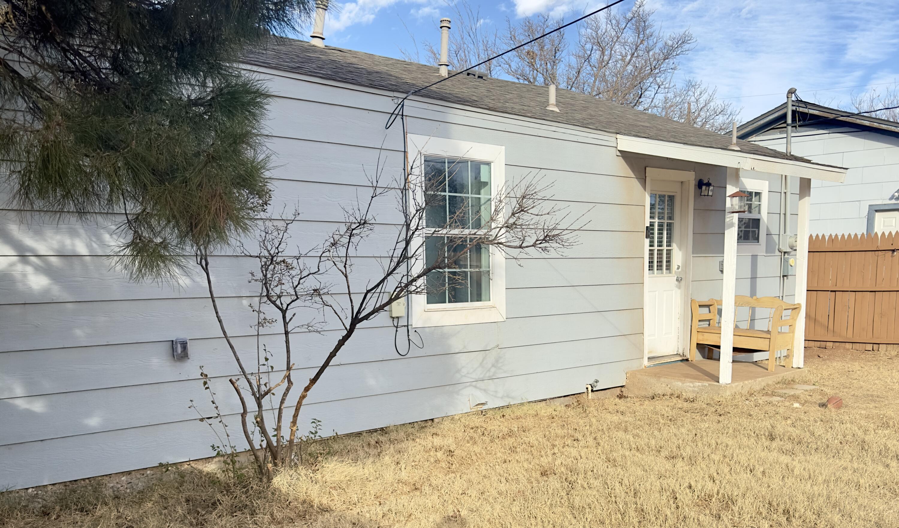 4807 39th Street Lubbock, TX 79414 - Photo 28 of 29 a house that has a tree in front of it